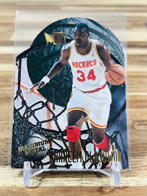 1995 Fleer Metal #7 - Hakeem Olajuwon - Maximum Metal Die Cut